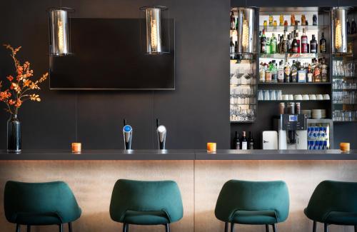 Imagen del bar/restaurante del Hotel LEONARDO SALZBURG AIRPORT. Foto 9