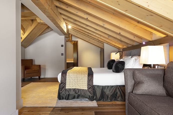 Imagen de la habitación del Hotel LES SUITES DE LA POTINIERE. Foto 2