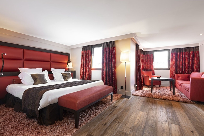 Imagen de la habitación del Hotel LES SUITES DE LA POTINIERE. Foto 3