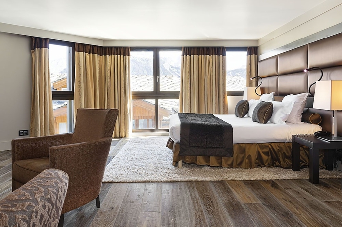 Imagen de la habitación del Hotel LES SUITES DE LA POTINIERE. Foto 6