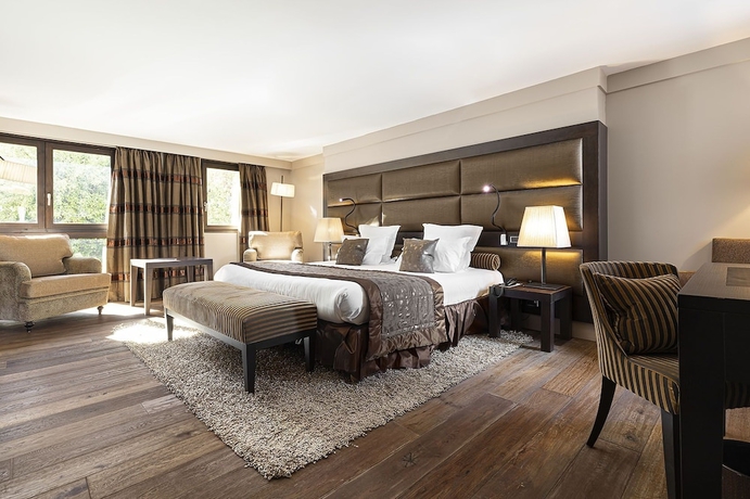 Imagen de la habitación del Hotel LES SUITES DE LA POTINIERE. Foto 7