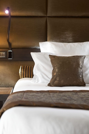 Imagen de la habitación del Hotel LES SUITES DE LA POTINIERE. Foto 11