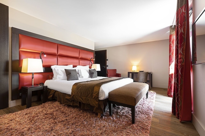 Imagen de la habitación del Hotel LES SUITES DE LA POTINIERE. Foto 16