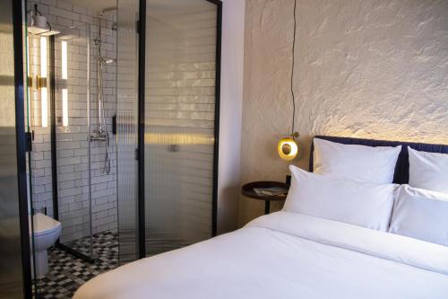 Imagen de la habitación del Hotel LETOH LETOH Sevilla. Foto 13