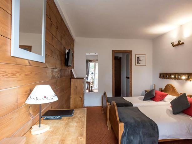 Imagen de la habitación del Hotel L'Ecureuil. Foto 7