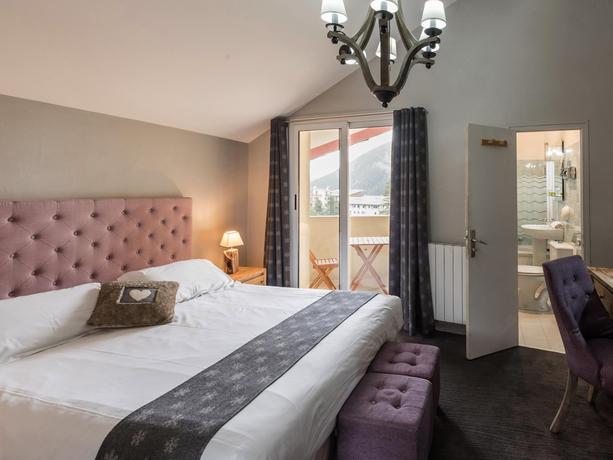 Imagen de la habitación del Hotel L'Ecureuil. Foto 9