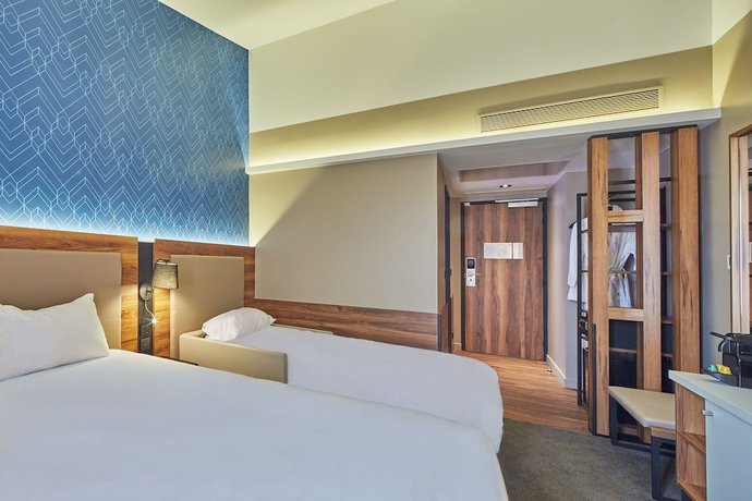 Imagen de la habitación del Hotel L'Elysee Val D'Europe. Foto 9