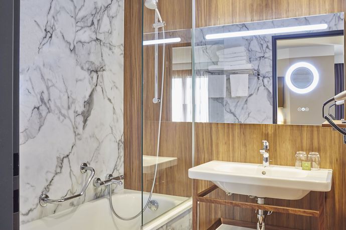 Imagen de la habitación del Hotel L'Elysee Val D'Europe. Foto 21