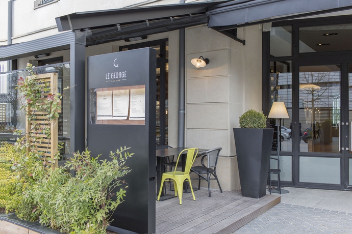 Imagen del bar/restaurante del Hotel L'Elysee Val D'Europe. Foto 5