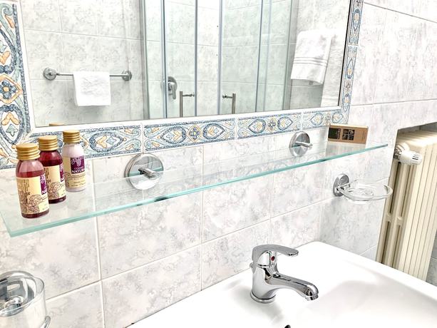 Imagen de la habitación del Hotel L\'Ennesima Osteria con Alloggio - Bike. Foto 14