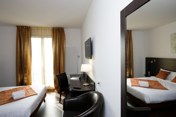 Imagen de la habitación del Hotel L\'Epi Hotel. Foto 12