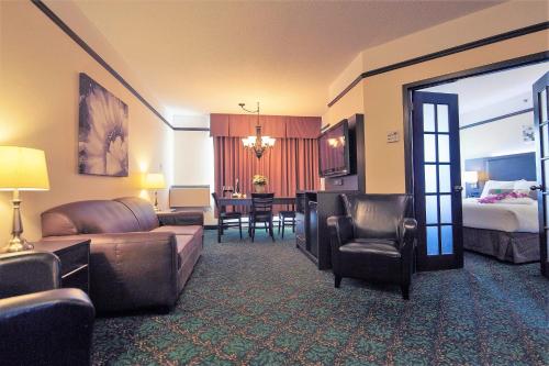 Imagen de la habitación del Hotel L\'Escale H&ocirc;tel Suites. Foto 7