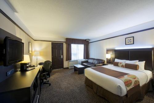 Imagen de la habitación del Hotel L\'Escale H&ocirc;tel Suites. Foto 9