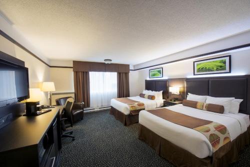 Imagen de la habitación del Hotel L\'Escale H&ocirc;tel Suites. Foto 10