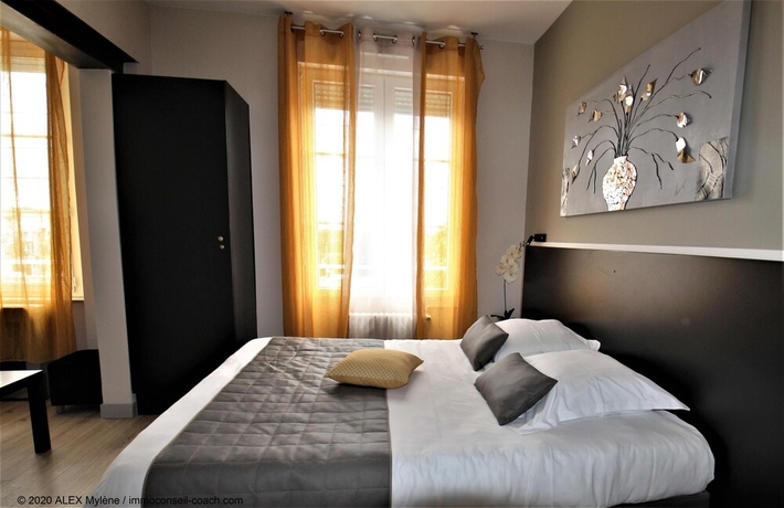 Imagen de la habitación del Hotel L\'Escale de la Gare. Foto 10