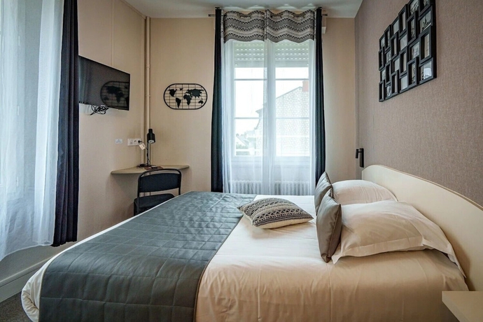 Imagen de la habitación del Hotel L\'Escale de la Gare. Foto 13