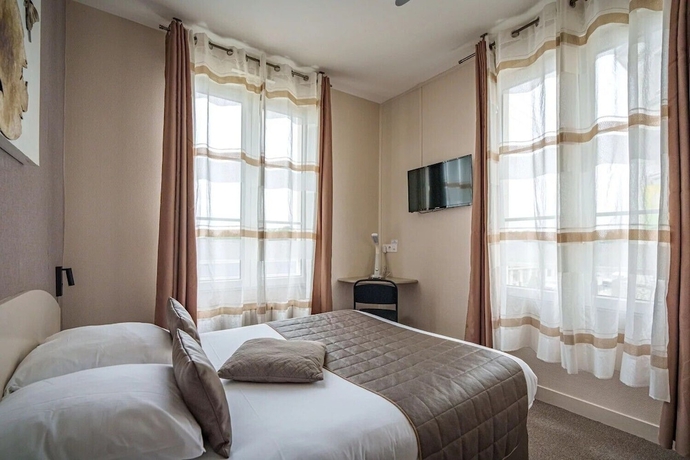 Imagen de la habitación del Hotel L\'Escale de la Gare. Foto 14