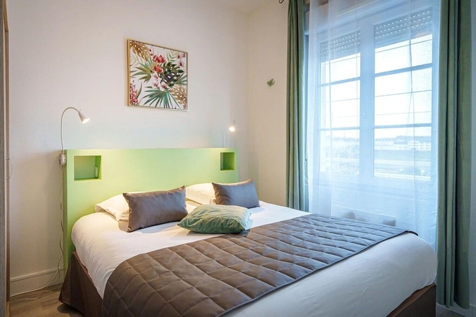 Imagen de la habitación del Hotel L\'Escale de la Gare. Foto 15