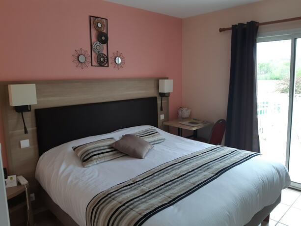 Imagen de la habitación del Hotel L\'Escapade. Foto 18