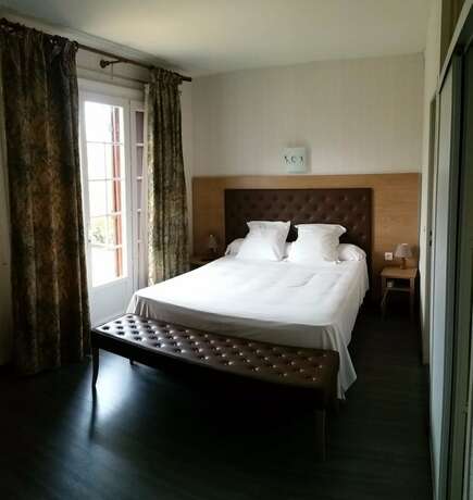 Imagen de la habitación del Hotel L\'Etang des Reynats. Foto 18