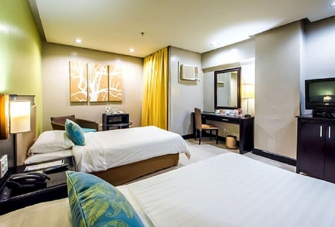 Imagen de la habitación del Hotel L'Fisher Ecotel. Foto 18