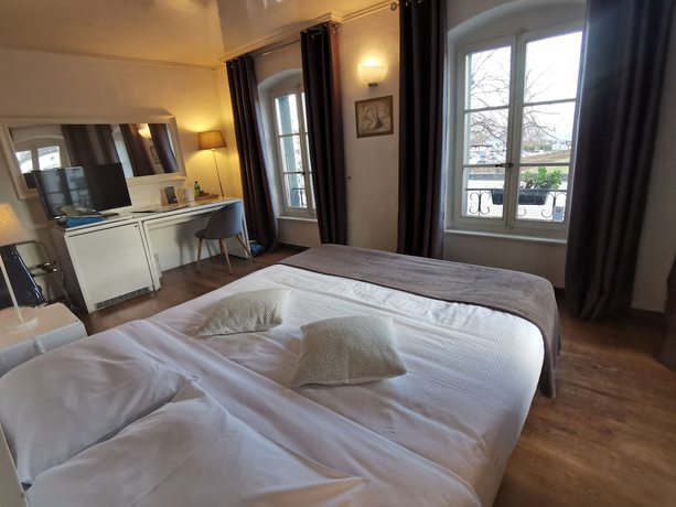 Imagen de la habitación del Hotel L\'H&Ocirc;TEL by Hostellerie du Ch&acirc;teau. Foto 4