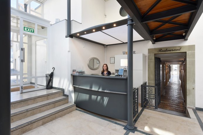 Imagen de los interiores del Hotel L\'H&Ocirc;TEL by Hostellerie du Ch&acirc;teau. Foto 19