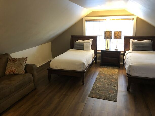 Imagen de la habitación del Hotel L\'Habitation Guest House. Foto 13