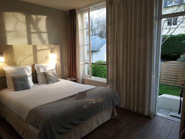 Imagen de la habitación del Hotel L'Hôtel Particulier Ascott. Foto 15