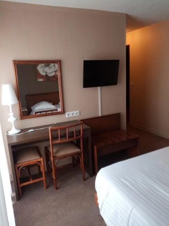 Imagen de la habitación del Hotel L\'Hostellerie De La Rivière. Foto 13