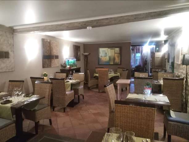 Imagen del bar/restaurante del Hotel L\'Hostellerie De La Rivière. Foto 8