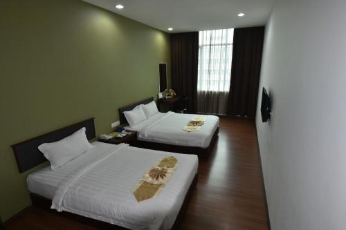 Imagen de la habitación del Hotel LI HUA HOTEL , BINTULU SENTRAL. Foto 18