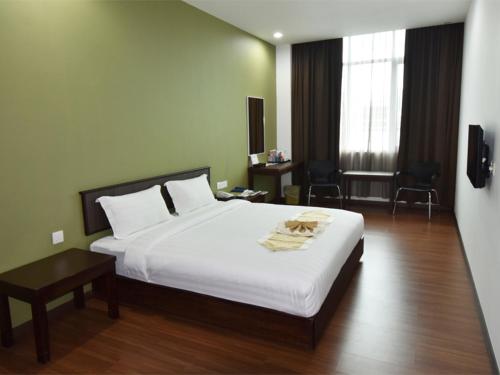 Imagen de la habitación del Hotel LI HUA HOTEL , BINTULU SENTRAL. Foto 20