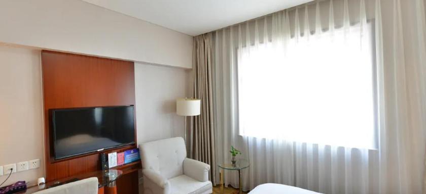 Imagen de la habitación del Hotel LIAONING HOTEL BEIJING. Foto 4