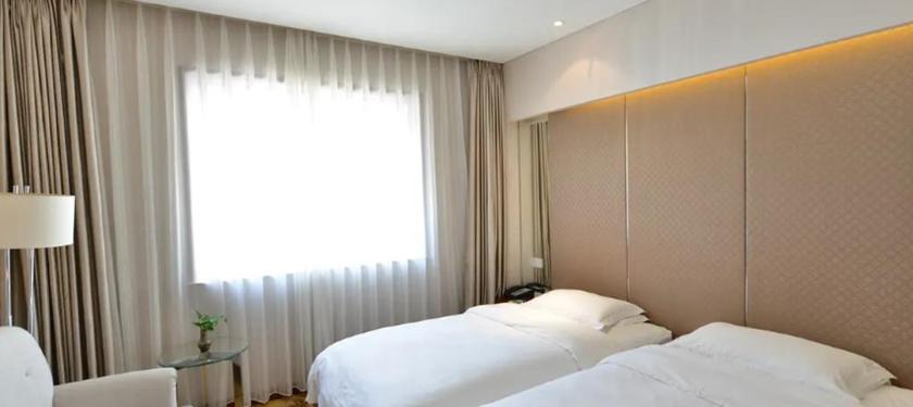 Imagen de la habitación del Hotel LIAONING HOTEL BEIJING. Foto 12