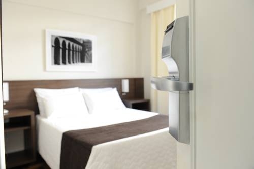 Imagen de la habitación del Hotel LIDO, Porto Alegre. Foto 10