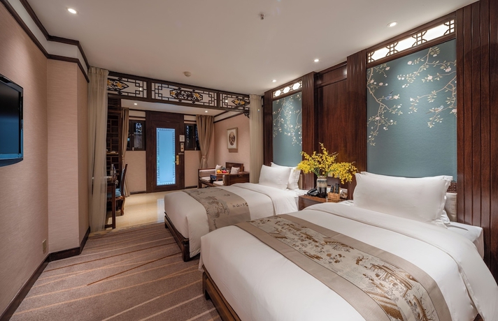 Imagen general del Hotel LIJIANG DUOFU RESORT HOTEL. Foto 1