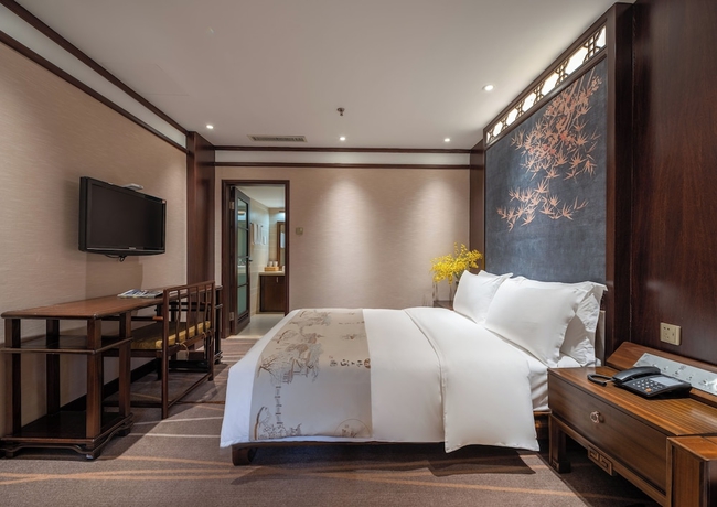 Imagen de la habitación del Hotel LIJIANG DUOFU RESORT HOTEL. Foto 2