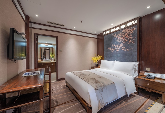 Imagen de la habitación del Hotel LIJIANG DUOFU RESORT HOTEL. Foto 3