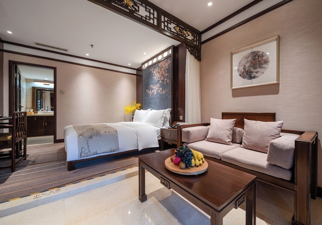 Imagen de la habitación del Hotel LIJIANG DUOFU RESORT HOTEL. Foto 4