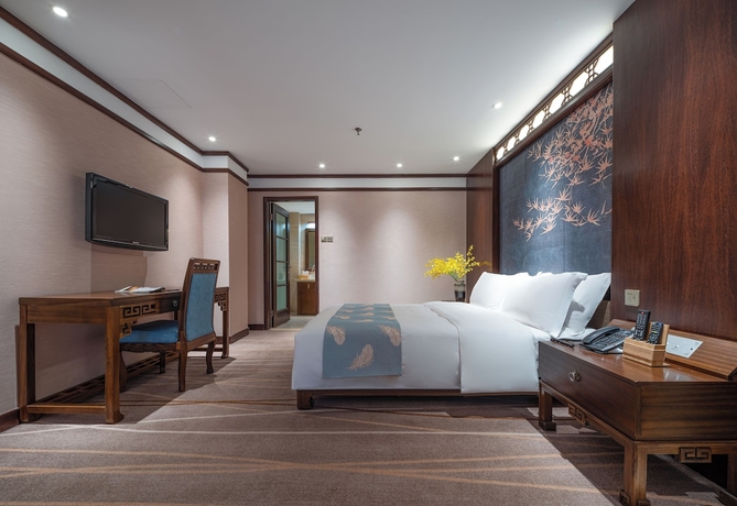 Imagen de la habitación del Hotel LIJIANG DUOFU RESORT HOTEL. Foto 5