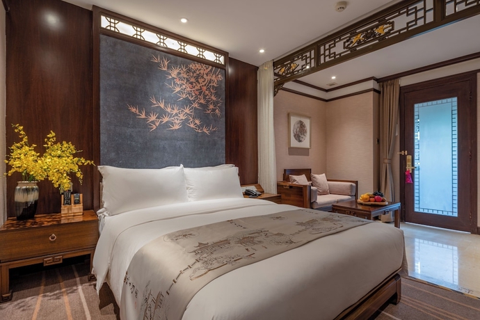 Imagen de la habitación del Hotel LIJIANG DUOFU RESORT HOTEL. Foto 6