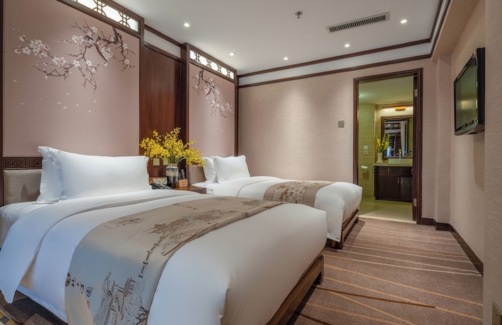 Imagen de la habitación del Hotel LIJIANG DUOFU RESORT HOTEL. Foto 8