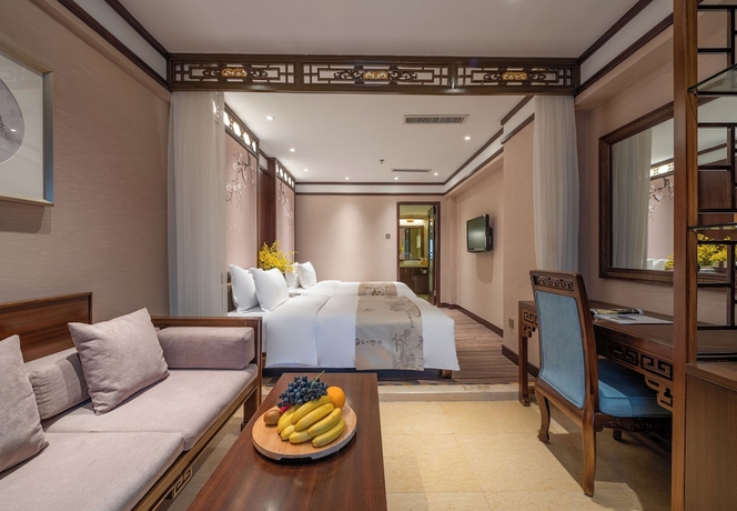 Imagen de la habitación del Hotel LIJIANG DUOFU RESORT HOTEL. Foto 9