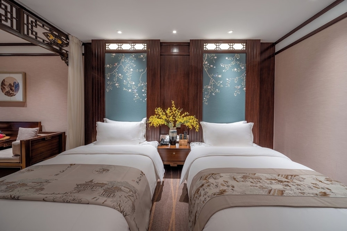 Imagen de la habitación del Hotel LIJIANG DUOFU RESORT HOTEL. Foto 12