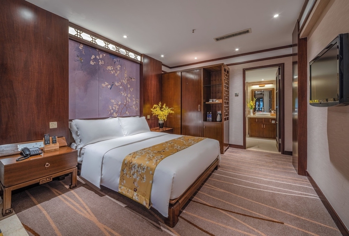 Imagen de la habitación del Hotel LIJIANG DUOFU RESORT HOTEL. Foto 15