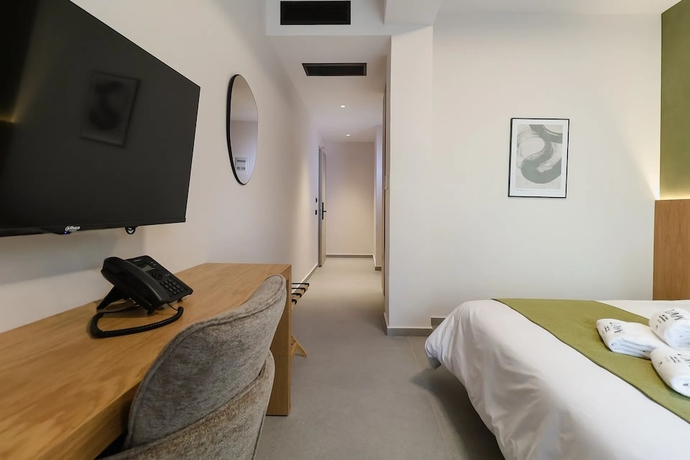 Imagen de la habitación del Hotel LIMNI Boutique Experience. Foto 14