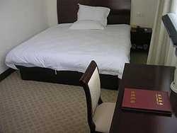 Imagen de la habitación del Hotel LINDUN BUSINESS. Foto 3