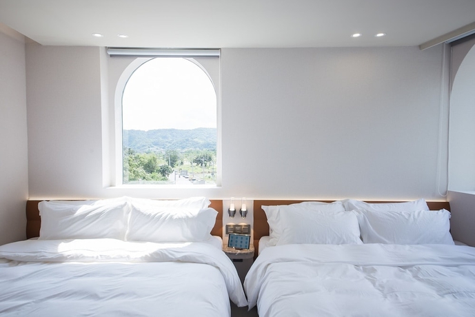 Imagen de la habitación del Hotel LIVIN, Jiaoxi. Foto 6
