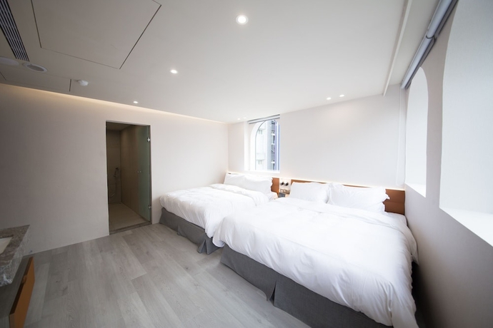 Imagen de la habitación del Hotel LIVIN, Jiaoxi. Foto 7